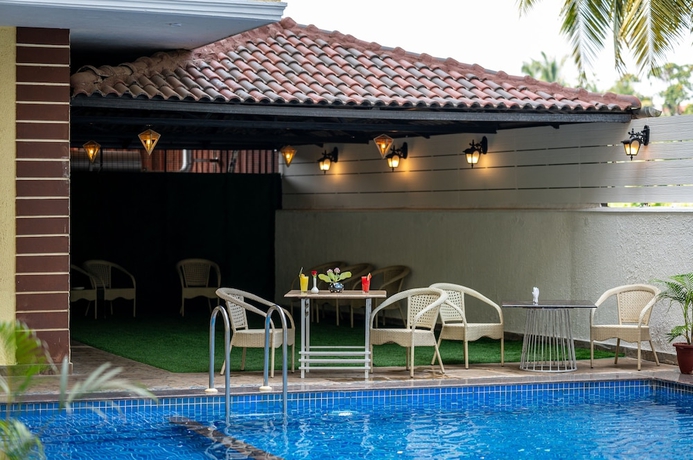 Imagen de la piscina del Hotel Bells Beach Resort Goa. Foto 15