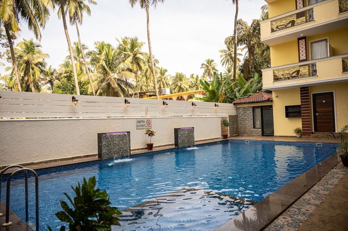 Imagen de la piscina del Hotel Bells Beach Resort Goa. Foto 17