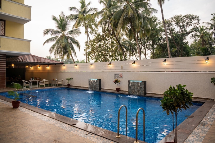 Imagen de la piscina del Hotel Bells Beach Resort Goa. Foto 18