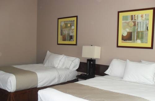 Imagen de la habitación del Hotel Bell's Extended Stay and Suites. Foto 11