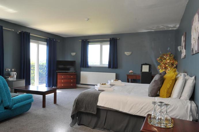 Imagen de la habitación del Hotel Bells and Country Club. Foto 5