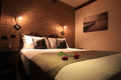 Imagen de la habitación del Hotel Belltower Motor Inn. Foto 2