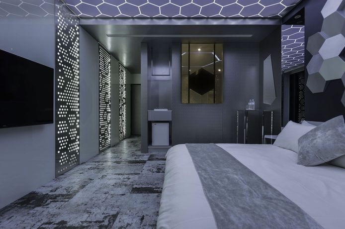 Imagen de la habitación del Hotel Bellus Inn. Foto 4