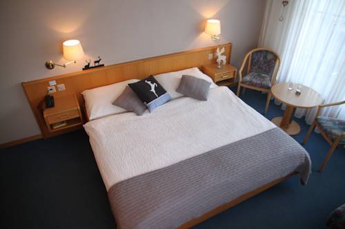 Imagen de la habitación del Hotel Bellwald. Foto 14