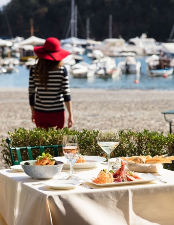 Imagen del bar/restaurante del Hotel Belmond Splendido Mare. Foto 9