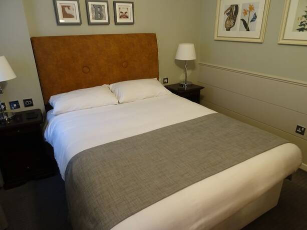 Imagen de la habitación del Hotel Belmore. Foto 11