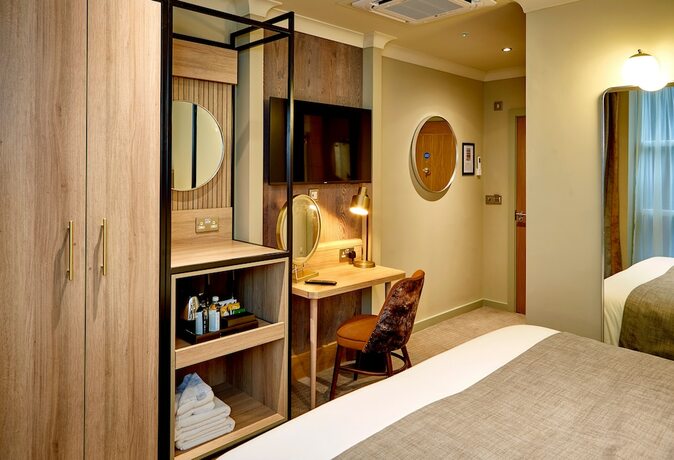 Imagen de la habitación del Hotel Belmore. Foto 20