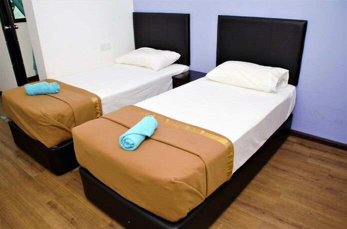 Imagen de la habitación del Hotel Belmorris Greentown. Foto 16