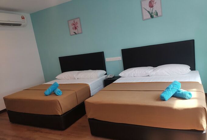 Imagen de la habitación del Hotel Belmorris Greentown. Foto 17