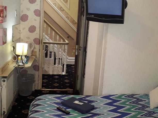 Imagen de la habitación del Hotel Belroy. Foto 12