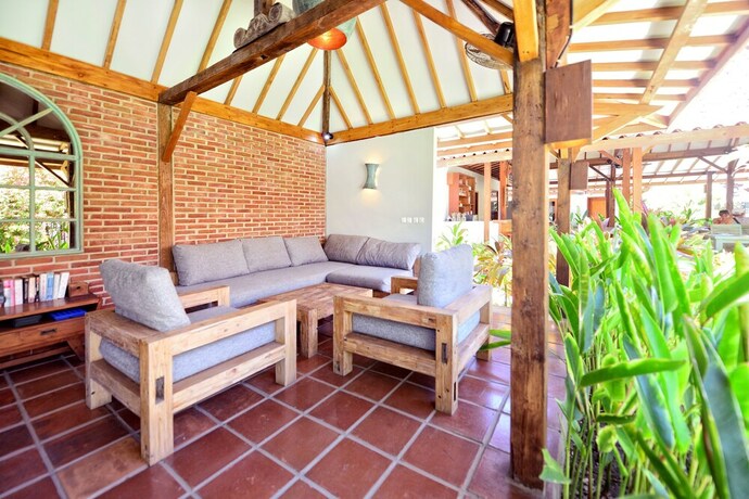 Imagen del bar/restaurante del Hotel Belukar Villas. Foto 17