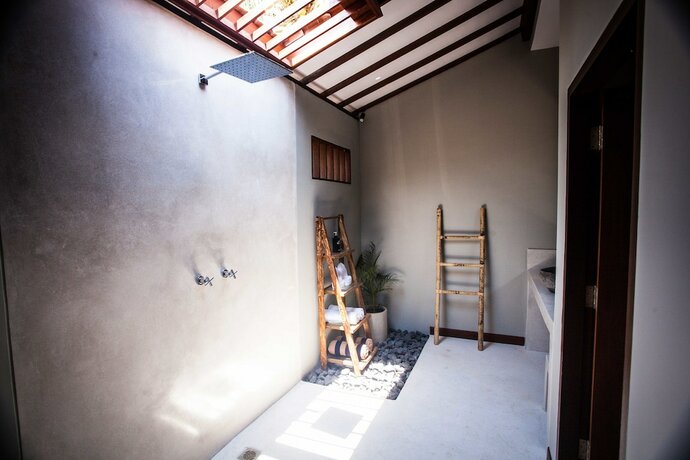 Imagen de la habitación del Hotel Belukar Villas. Foto 20