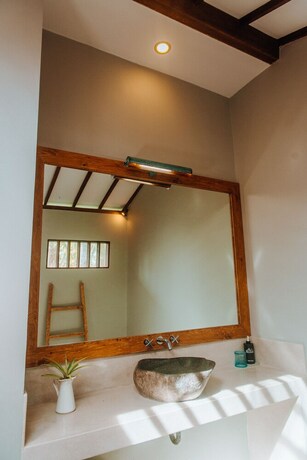 Imagen de la habitación del Hotel Belukar Villas. Foto 24