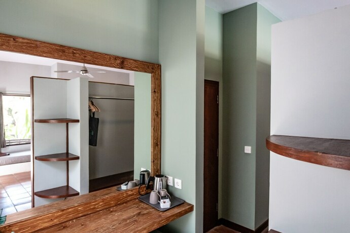 Imagen de la habitación del Hotel Belukar Villas. Foto 26