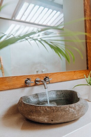 Imagen de la habitación del Hotel Belukar Villas. Foto 31