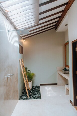 Imagen de la habitación del Hotel Belukar Villas. Foto 34