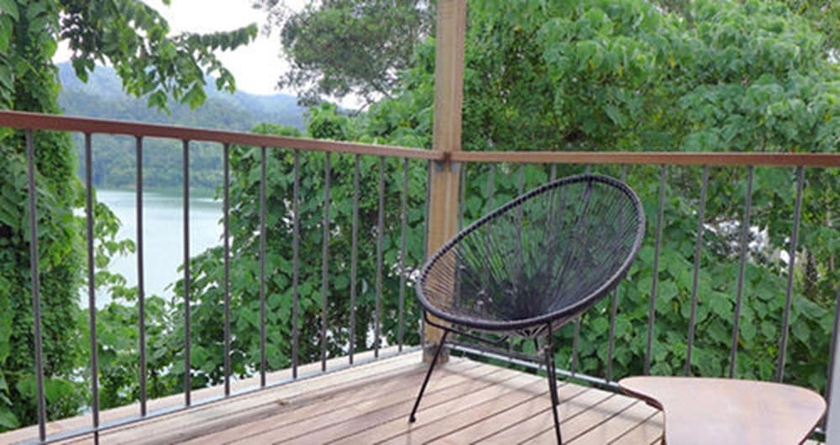 Imagen de la habitación del Hotel Belum Rainforest Resort. Foto 16