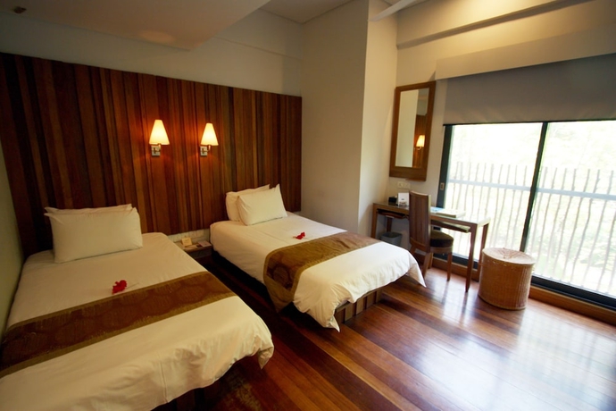 Imagen de la habitación del Hotel Belum Rainforest Resort. Foto 17