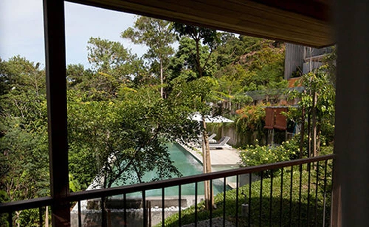 Imagen de la habitación del Hotel Belum Rainforest Resort. Foto 19