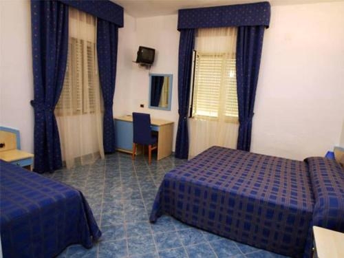 Imagen de la habitación del Hotel Belvedere Club. Foto 9