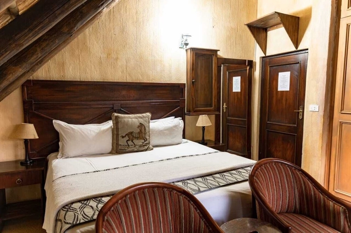 Imagen de la habitación del Hotel Belvedere Estate. Foto 11