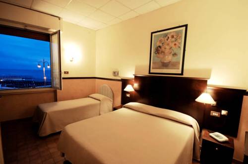 Imagen de la habitación del Hotel Belvedere, Lido di Ostia. Foto 3