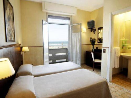 Imagen de la habitación del Hotel Belvedere, Lido di Ostia. Foto 13