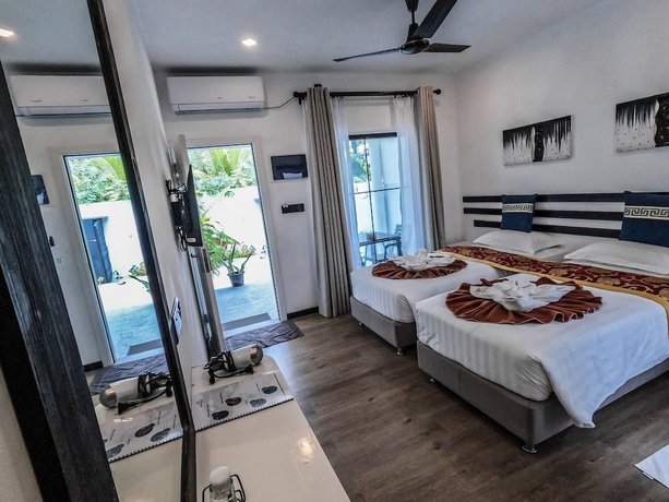 Imagen de la habitación del Hotel Belvedere Thoddoo. Foto 5