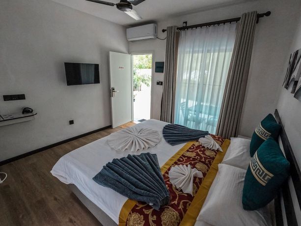 Imagen de la habitación del Hotel Belvedere Thoddoo. Foto 10