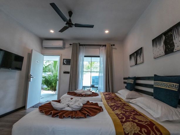 Imagen de la habitación del Hotel Belvedere Thoddoo. Foto 13