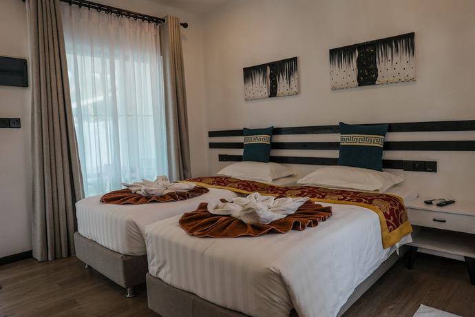 Imagen de la habitación del Hotel Belvedere Thoddoo. Foto 14