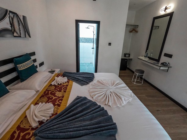 Imagen de la habitación del Hotel Belvedere Thoddoo. Foto 15