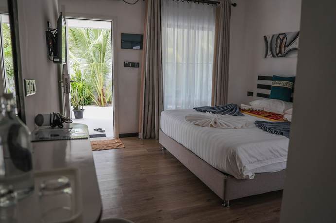 Imagen de la habitación del Hotel Belvedere Thoddoo. Foto 17