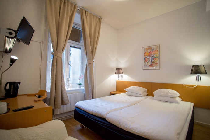 Imagen de la habitación del Hotel Bema. Foto 18