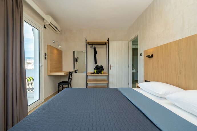 Imagen de la habitación del Hotel Bemyguest Comfort Zefyros. Foto 18