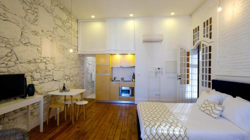 Imagen de la habitación del Hotel Bemyguest - Loft Guest House Jardim das M&atilde;es Charming. Foto 12