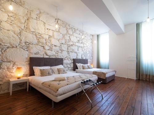 Imagen de la habitación del Hotel Bemyguest - Loft Guest House Jardim das M&atilde;es Charming. Foto 13