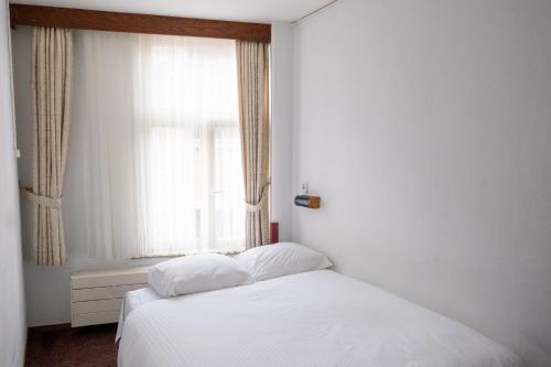 Imagen de la habitación del Hotel Ben Centre. Foto 7