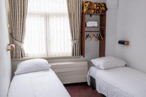 Imagen de la habitación del Hotel Ben Centre. Foto 8