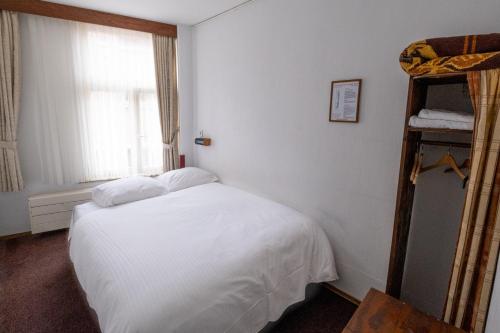 Imagen de la habitación del Hotel Ben Centre. Foto 10