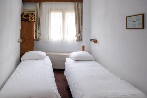 Imagen de la habitación del Hotel Ben Centre. Foto 12