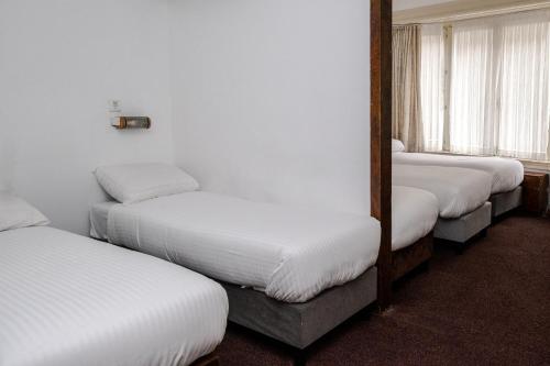 Imagen de la habitación del Hotel Ben Centre. Foto 13