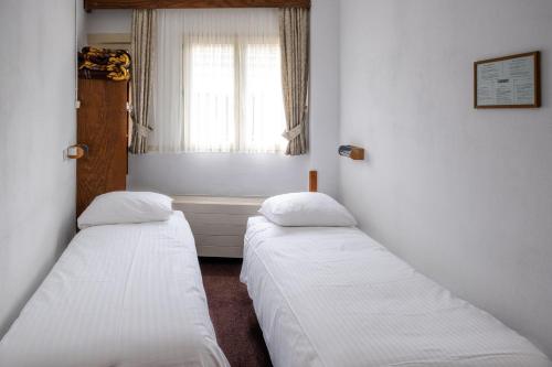 Imagen de la habitación del Hotel Ben Centre. Foto 15