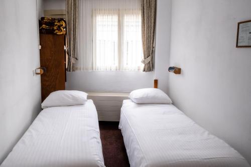 Imagen de la habitación del Hotel Ben Centre. Foto 16