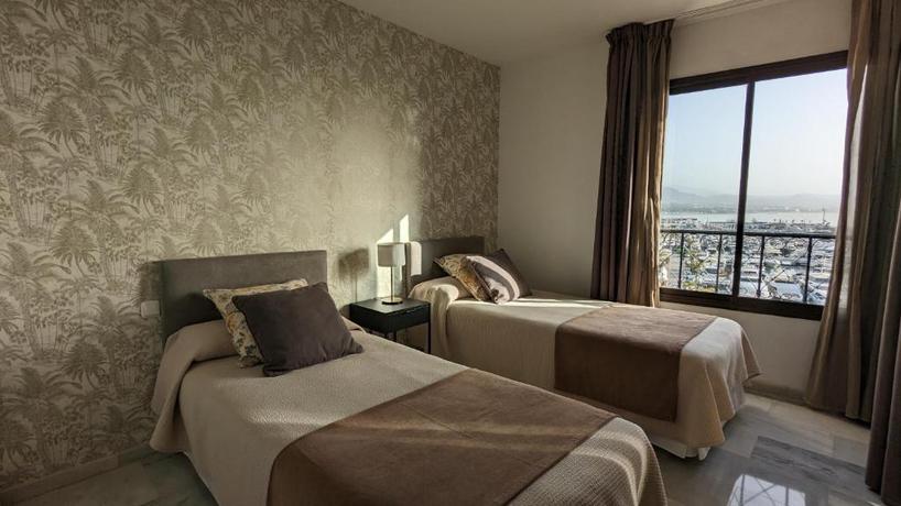 Imagen de la habitación del Hotel Benabola Hotel y Suites. Foto 16