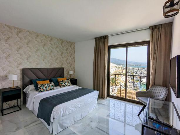 Imagen de la habitación del Hotel Benabola Hotel y Suites. Foto 17