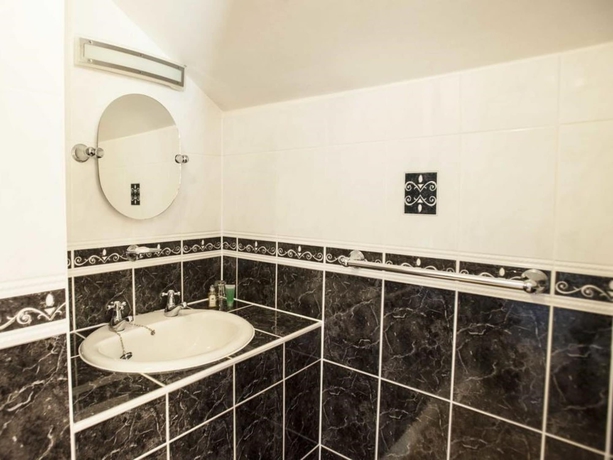 Imagen de la habitación del Hotel Bendene Townhouse. Foto 8