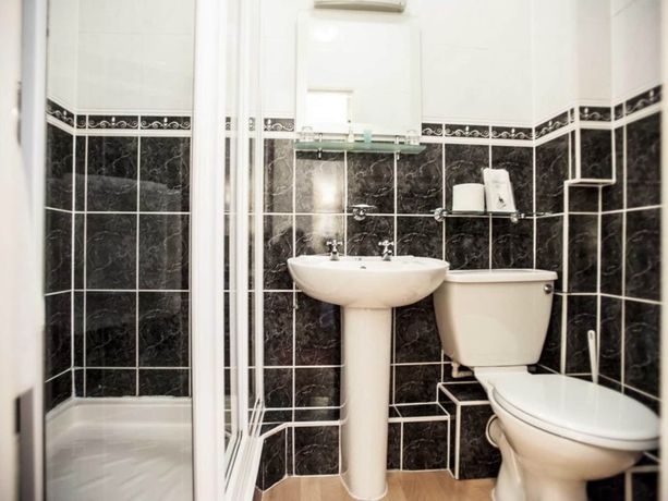 Imagen de la habitación del Hotel Bendene Townhouse. Foto 9