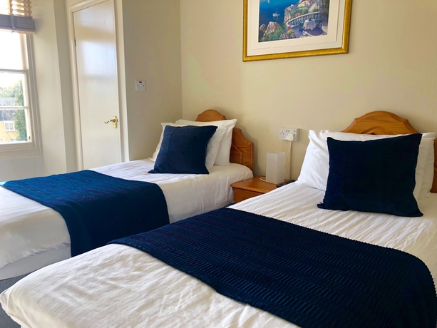 Imagen de la habitación del Hotel Bendene Townhouse. Foto 10