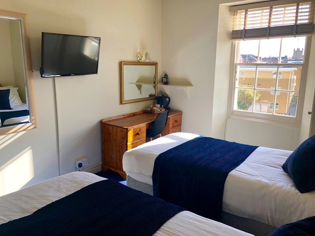 Imagen de la habitación del Hotel Bendene Townhouse. Foto 11